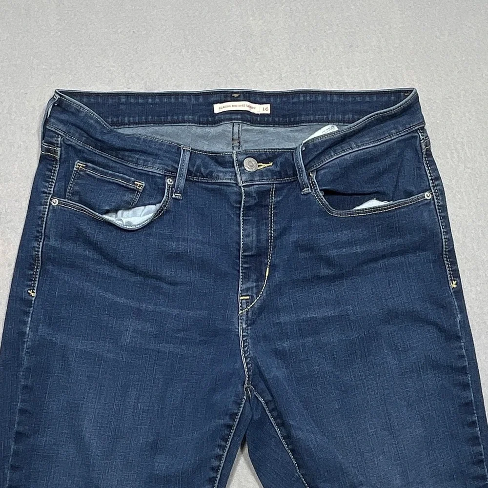Levis Classic Mid Rise Cut Off‎ Shorts Women 16 Raw Hem Dark Blue Denim Casual
